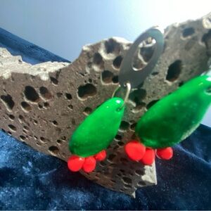 Prickly pear paddle with tuna statement earrings.